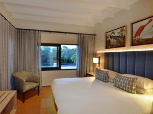 Postel nebo postele na pokoji v ubytování ANEW Resort Hazyview Kruger Park