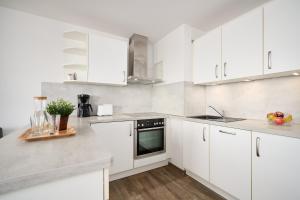 Η κουζίνα ή μικρή κουζίνα στο Promenade 27 Wohnung 30
