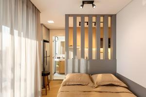 Postel nebo postele na pokoji v ubytování Alto & Estilo | Batel