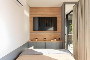 Postel nebo postele na pokoji v ubytování Alto & Estilo | Batel