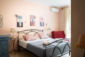 Postel nebo postele na pokoji v ubytování Casa degli zii