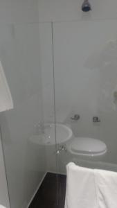 Koupelna v ubytování Hotel Casa Suite Curiti
