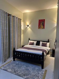 Postel nebo postele na pokoji v ubytování D&Y Homes + 3 fotografie