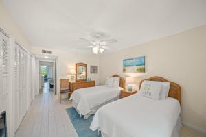 Giường trong phòng chung tại The Perfect Condo +47 ảnh