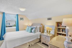 Postel nebo postele na pokoji v ubytování Island Breeze + 34 fotografií