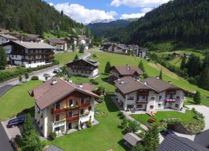 an aerial view of a village in the mountains at Apartments Vaiolet in Santa Cristina Gherdëina