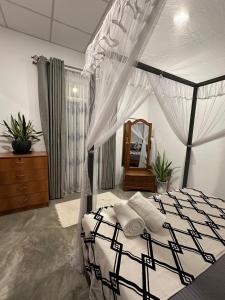 Ένα ή περισσότερα κρεβάτια σε δωμάτιο στο Villa Krish