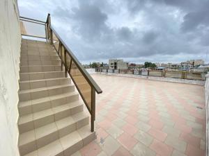 a staircase on the roof of a building at Romo appart 1 in Cotonou