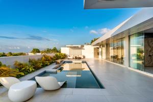 an image of a house with a swimming pool at Sky Star Uluwatu in Uluwatu