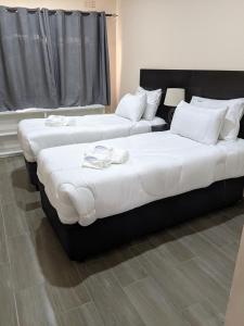 Postel nebo postele na pokoji v ubytování Waterfalls Landing