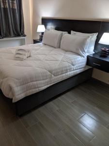 Postel nebo postele na pokoji v ubytování Waterfalls Landing