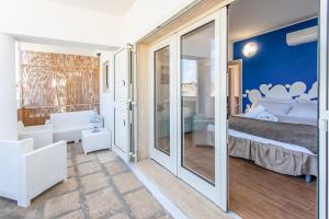 Ένα ή περισσότερα κρεβάτια σε δωμάτιο στο Camere Center House Gallipoli