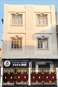 a building with akritkrit homes east guest house at Bhawani Homes in Varanasi