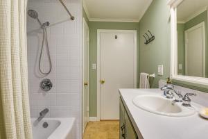 a bathroom with a sink and a shower and a tub at Near Main St and Festivals Peaceful Keene Getaway! in Keene +21 photos
