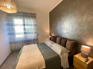 Ένα ή περισσότερα κρεβάτια σε δωμάτιο στο MM HOUSE Lainate modern design near Rho Fiera