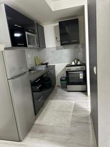 Kuchyň nebo kuchyňský kout v ubytování Mostar Luxury Apartment