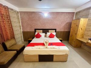 Postel nebo postele na pokoji v ubytování Hotel green Dalhousie