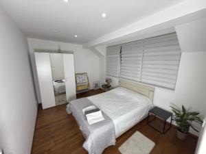 Ένα ή περισσότερα κρεβάτια σε δωμάτιο στο Sandra apartmani