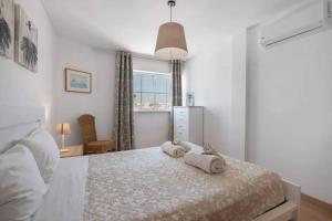 Postel nebo postele na pokoji v ubytování Vista Formosa Panoramico