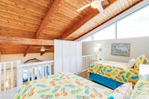 Ένα ή περισσότερα κρεβάτια σε δωμάτιο στο Villa Sanibel 1H