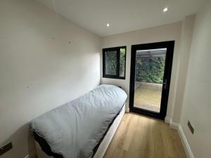 Ένα ή περισσότερα κρεβάτια σε δωμάτιο στο Twinz Lodge