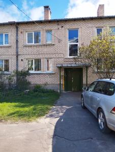 Bygningen som lejligheden ligger i + 3 billeder