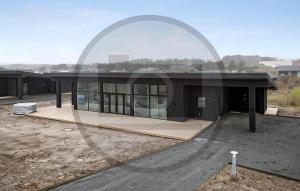 a building under construction with an archway on it at Stunning Home In Spøttrup With Sauna in Lem +11 photos