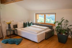 Postel nebo postele na pokoji v ubytování Mountain Vista - Bio Yoga Hof