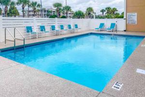 Bazén v ubytování Crystal Sands 111A nebo v jeho okolí