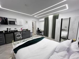 Ένα ή περισσότερα κρεβάτια σε δωμάτιο στο The Stay