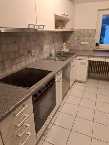 Dapur atau dapur kecil di FeWo Roth Walddorfhäslach