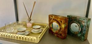 Příslušenství pro přípravu čaje a kávy v ubytování Opus Firenze Boutique B&B Puccini - City Center