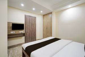 Giường trong phòng chung tại Hotel O Alpha Stayz