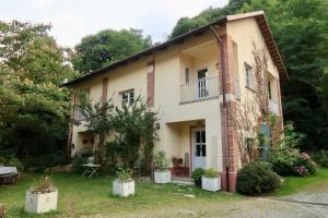a house with plants in front of it at Beatrice in Saluzzo