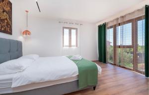 Ένα ή περισσότερα κρεβάτια σε δωμάτιο στο Gorgeous Home In Labin