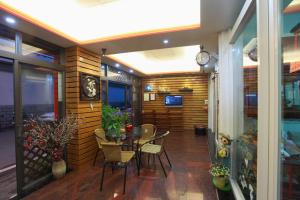 TV a/nebo společenská místnost v ubytování First Place B&B (Hualien Railway Station)