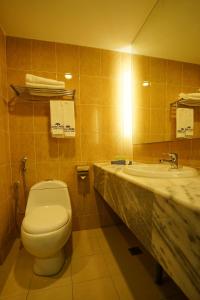 Koupelna v ubytování Hotel Anika Kluang