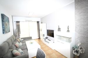 TV a/nebo společenská místnost v ubytování Fantastic apartment near the beach