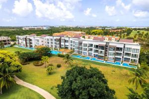 an aerial view of a resort with palm trees at Elegant Cocotal 2BD Condo in Punta Cana