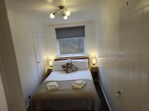 Ένα ή περισσότερα κρεβάτια σε δωμάτιο στο Seafield Crt, North Shore Beach