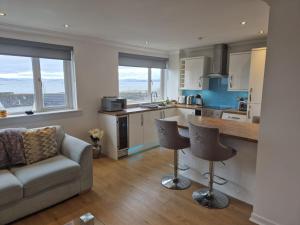 Η κουζίνα ή μικρή κουζίνα στο Seafield Crt, North Shore Beach