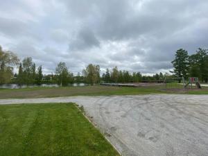 an empty park with a soccer field and a goal at Practical Apartment for 2 in Smedsbacka