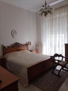 Ένα ή περισσότερα κρεβάτια σε δωμάτιο στο Libera