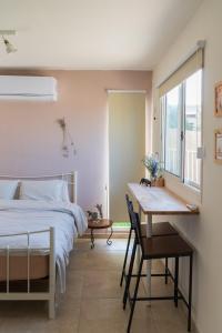 Postel nebo postele na pokoji v ubytování Restart Ramot-ריסטארט צימר ברמות