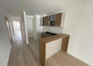 a kitchen with a counter top in a room at Apartamento in Montevideo
