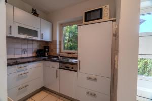 Η κουζίνα ή μικρή κουζίνα στο Seebrise - 2 Schlafzimmer - Terrasse - Bodensee