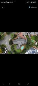 a screenshot of a picture of a house at Dee in Sandton