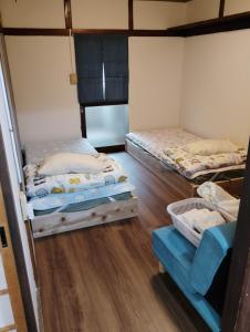 Postel nebo postele na pokoji v ubytování Ishinomaki - House - Vacation STAY 30731v