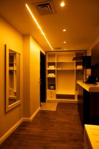 a kitchen with an open pantry and a refrigerator at Munir`s residence 3 in Cairo +290 photos