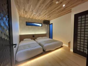 Katil atau katil-katil dalam bilik di Ume no Yu Takenoya - Vacation STAY 40917v